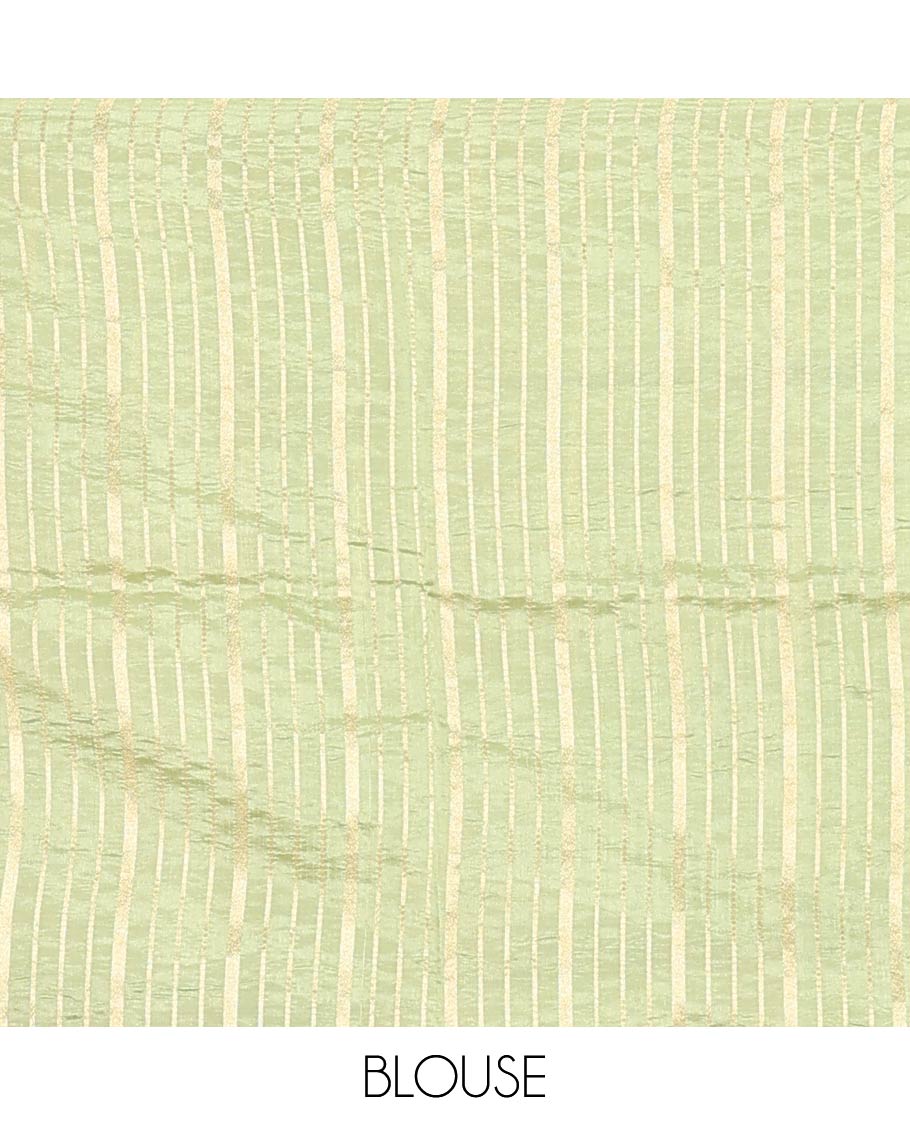 Purple Raw Mango Silk Saree Enthralled with Checks, Features a Contrast Chakram Motifs Border, a Zari-Elevated Pallu, and Paired with a Contrast Blouse