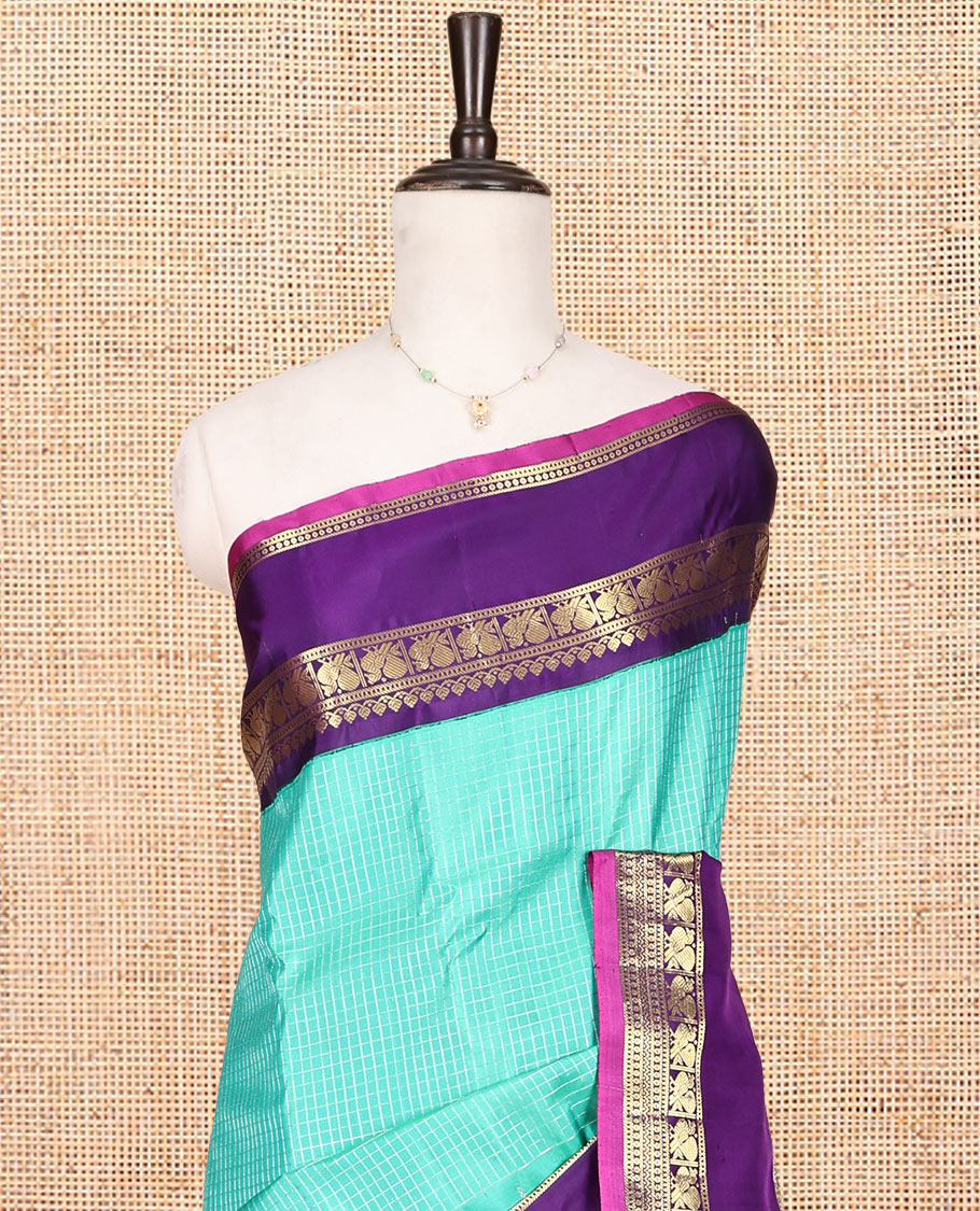 Turquoise Gadwal Silk Saree, Sparsely Threaded with Checks, Complemented by a Contrast Traditional Zari Border, Gleaming Zari Pallu, and a Contrast Blouse