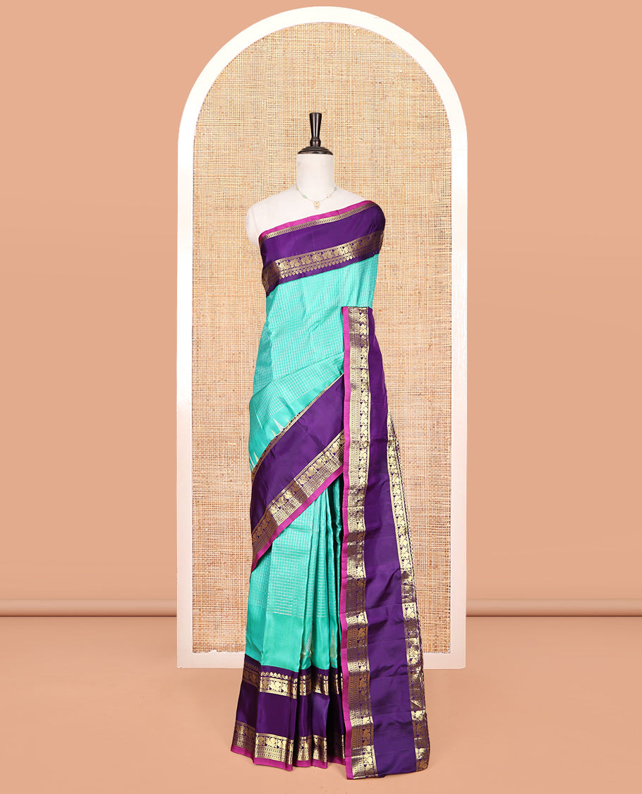 Turquoise Gadwal Silk Saree, Sparsely Threaded with Checks, Complemented by a Contrast Traditional Zari Border, Gleaming Zari Pallu, and a Contrast Blouse