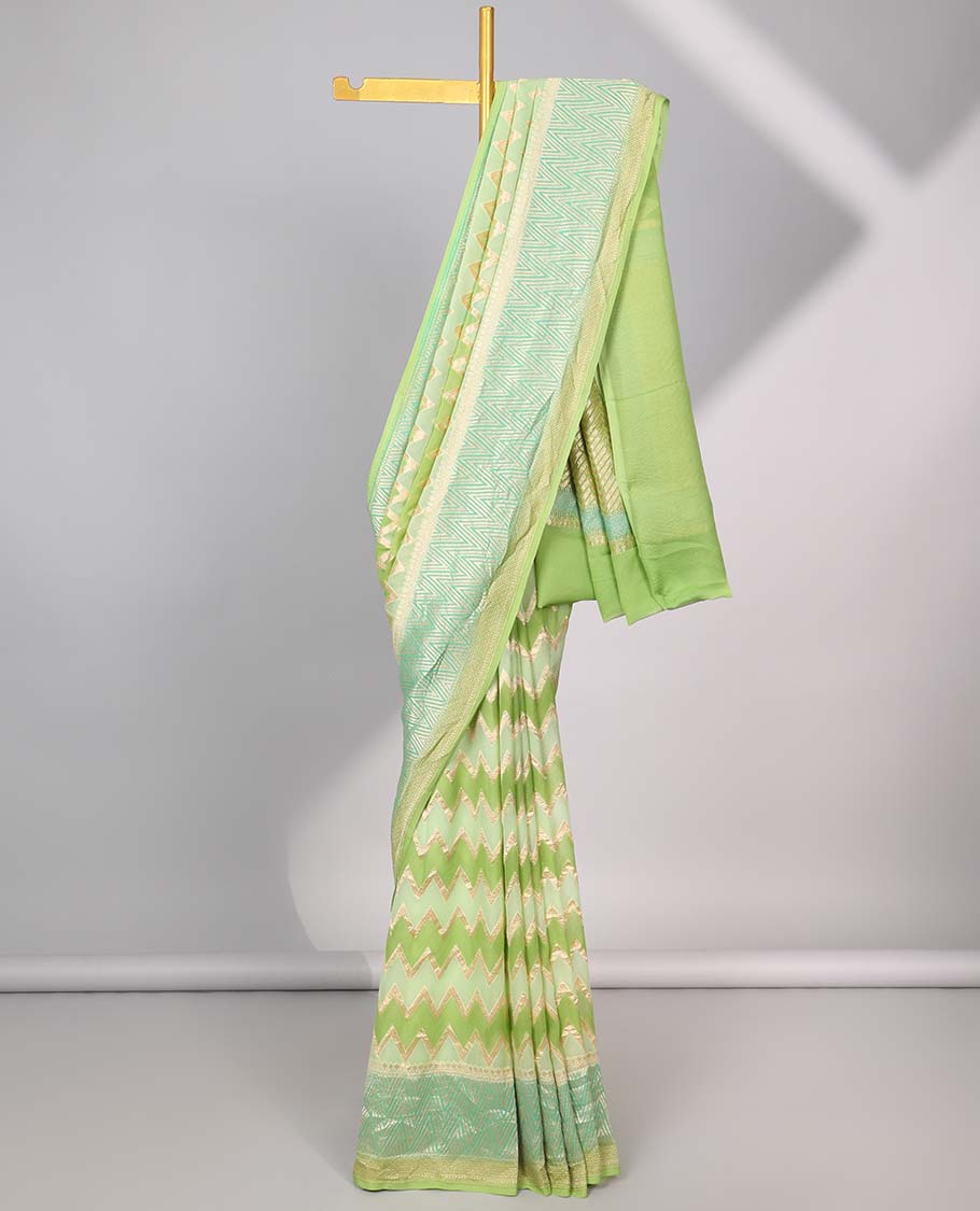 Green zig-zag striped banaras georgette saree with contrast border & geometric design pallu