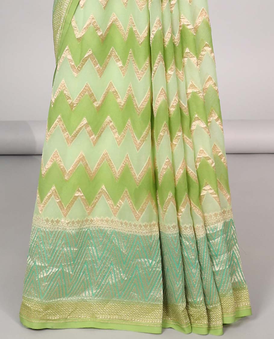 Green zig-zag striped banaras georgette saree with contrast border & geometric design pallu