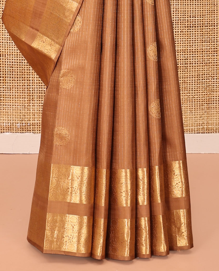 Pale Brown Kanchipuram Silk Saree, Subtly Sparkled with Zari Designs, Highlighted by a Zari Rettai Pettu Border of Poun, Mayil, and Kuthirai Designs, Grand Pallu, and Matching Blouse