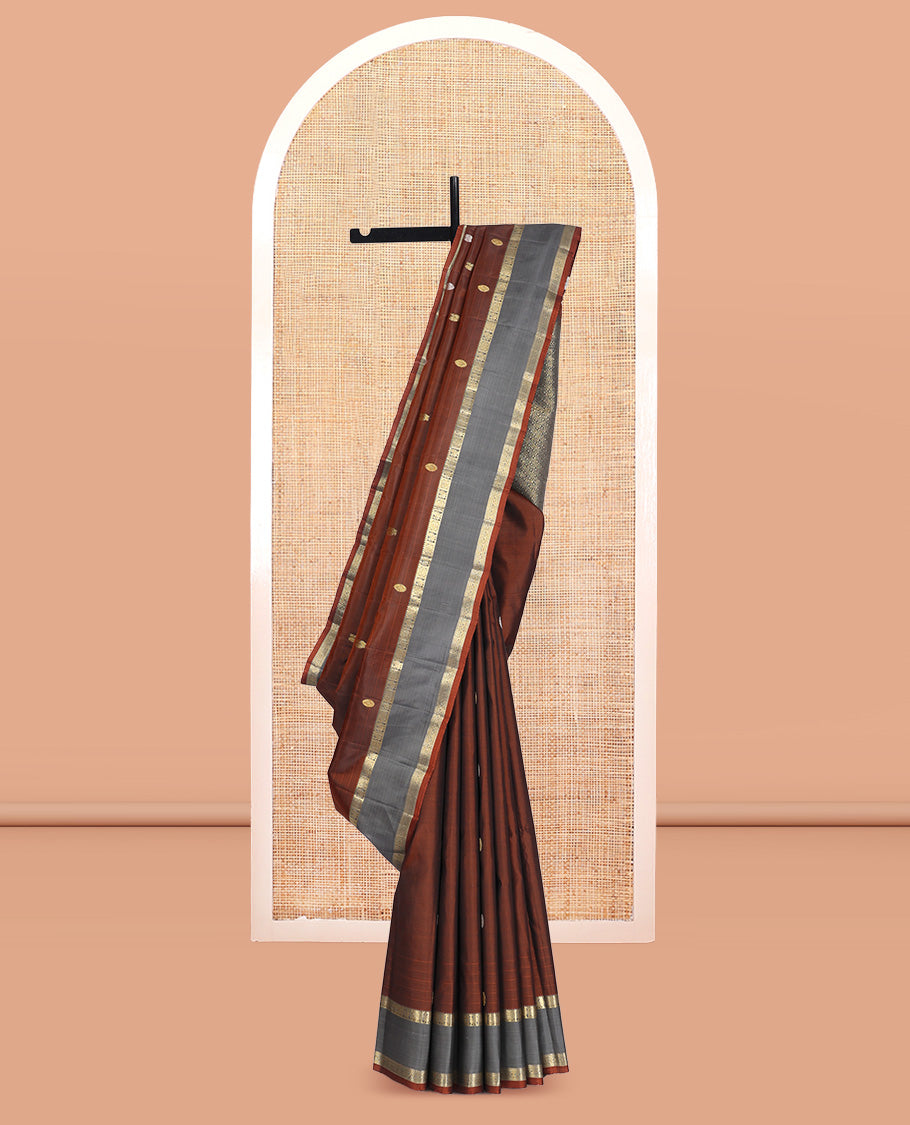 Brown Kanchipuram Silk Saree, Artfully Detailed with Mayil-Chakram Buttas, a Contrast Rettai Pettu Border of Mayil and Chakram Designs, Jaal Pallu, and a Contrast Blouse