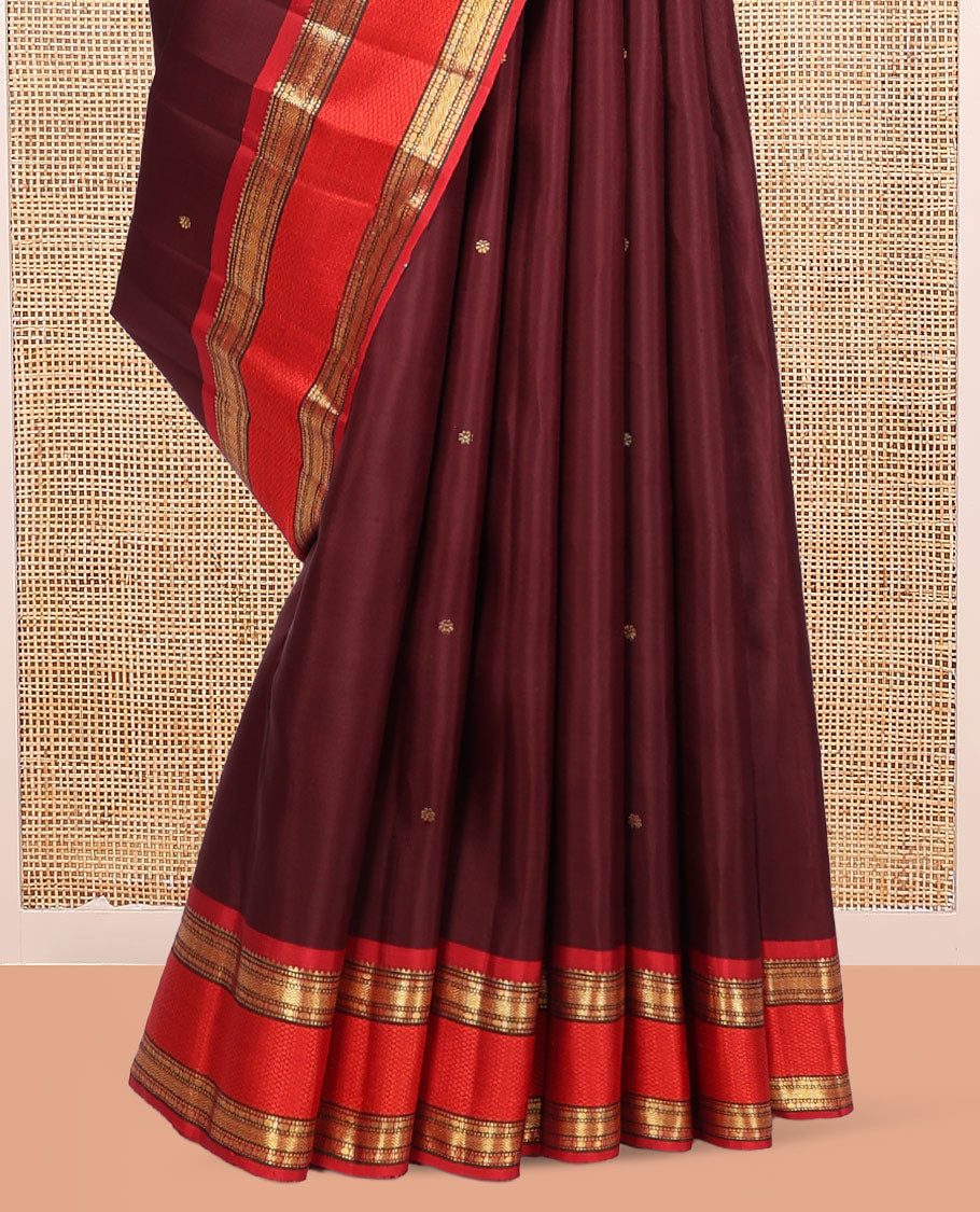 Maroon Kanchipuram Silk Saree, Elevated with Zari Buttas, Complemented by Contrast Border of Rekku, Muthu, Poun, Vanki, and Mayil Kann, Zari Design Pallu, and Contrast Blouse
