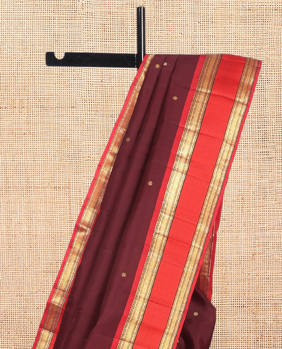 Maroon Kanchipuram Silk Saree, Elevated with Zari Buttas, Complemented by Contrast Border of Rekku, Muthu, Poun, Vanki, and Mayil Kann, Zari Design Pallu, and Contrast Blouse