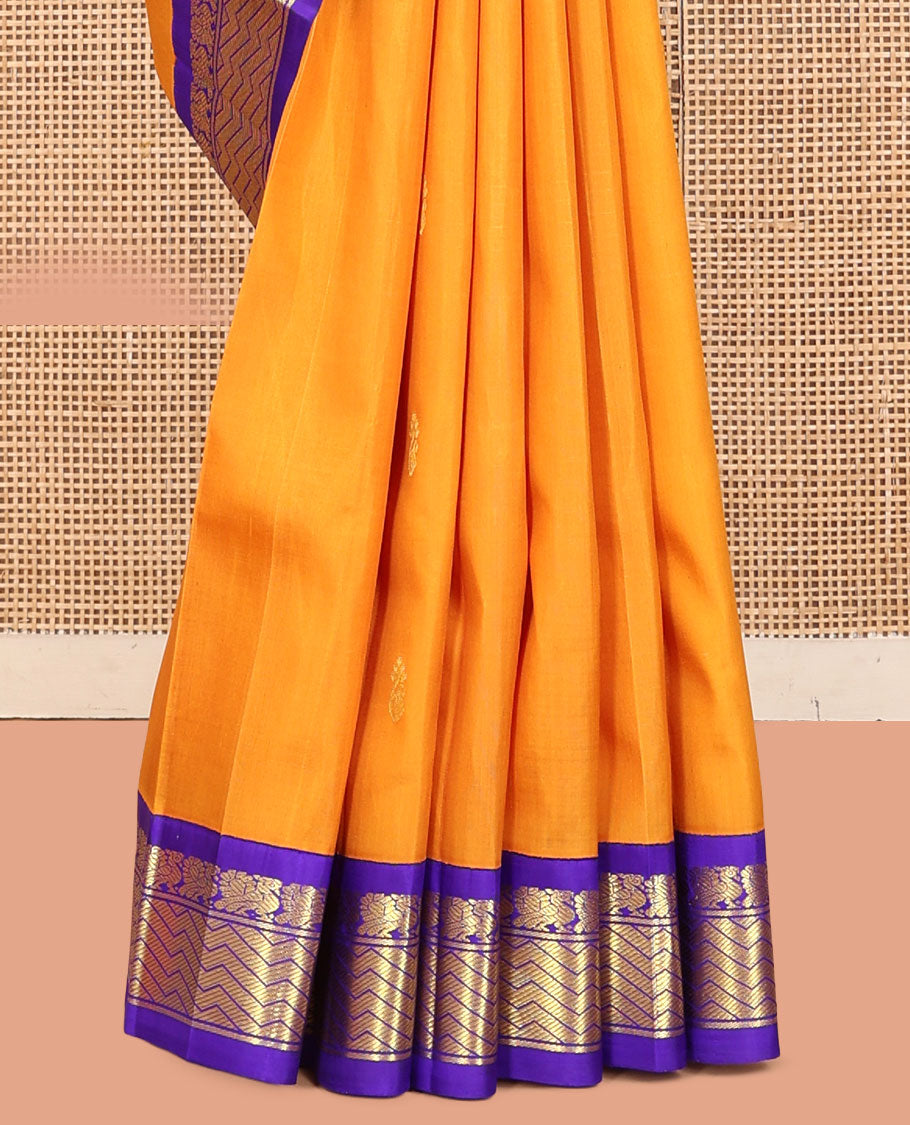 Yellow Kanchipuram Silk Saree, Subtly Sparkled with Zari Buttas, a Contrast One-Sided Korvai Border of Mayil Designs, a Floral Design Pallu, and No Blouse