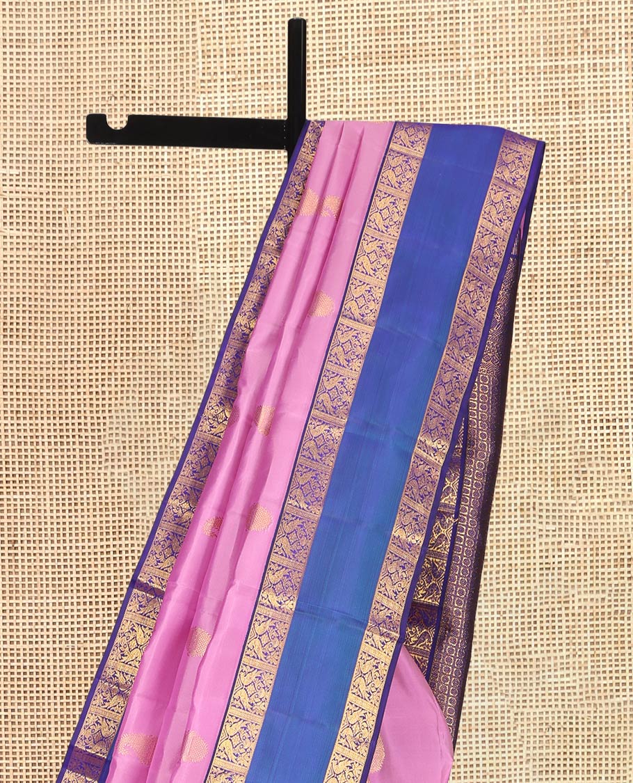 Pink Kanchipuram Silk Saree, Bedecked with Zari Buttas, a Contrast Korvai Rettai Pettu Border of Kili Designs, Butta Enclosed Checked Pallu, and a Contrast Blouse
