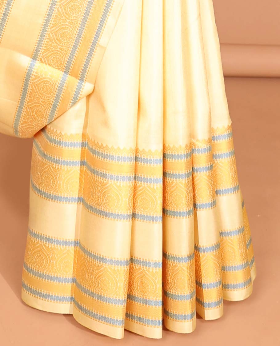 Cream floral buttas kancheepuram silk saree with self border of intricat zari design & peacock, floral design pallu