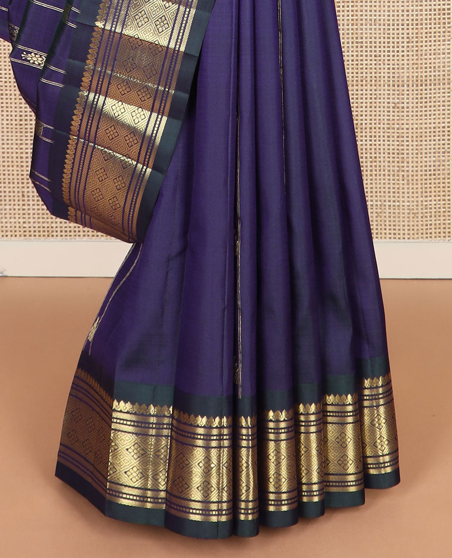 Blue thazampoo rekku buttas Kanchipuram silk saree, contrast one-sided border of thilakam mokku,muthu,banaras & jaal & zari design pallu