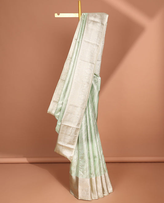 Green striped floral design kancheepuram tissue silk saree with self traditional zari border & intricate zari pallu