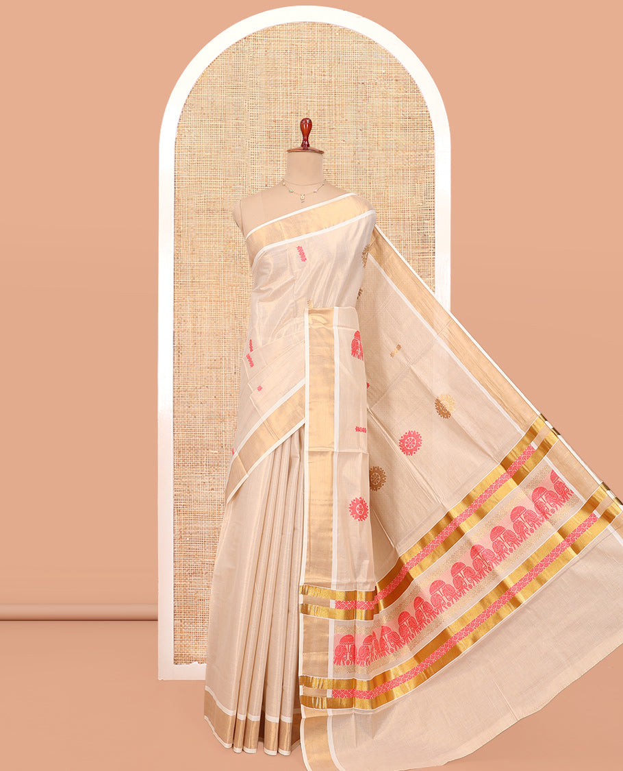 Cream Kerala Cotton Saree, Delicately Woven with Thread and Zari Buttas All Over Its Body, a Zari Bavanji Border, Pallu of Elephant Designs, and Paired with a Matching Blouse