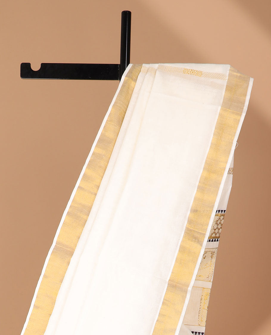 Cream kerala saree with zari designs, zari border & pallu of peacock & butterfly designs