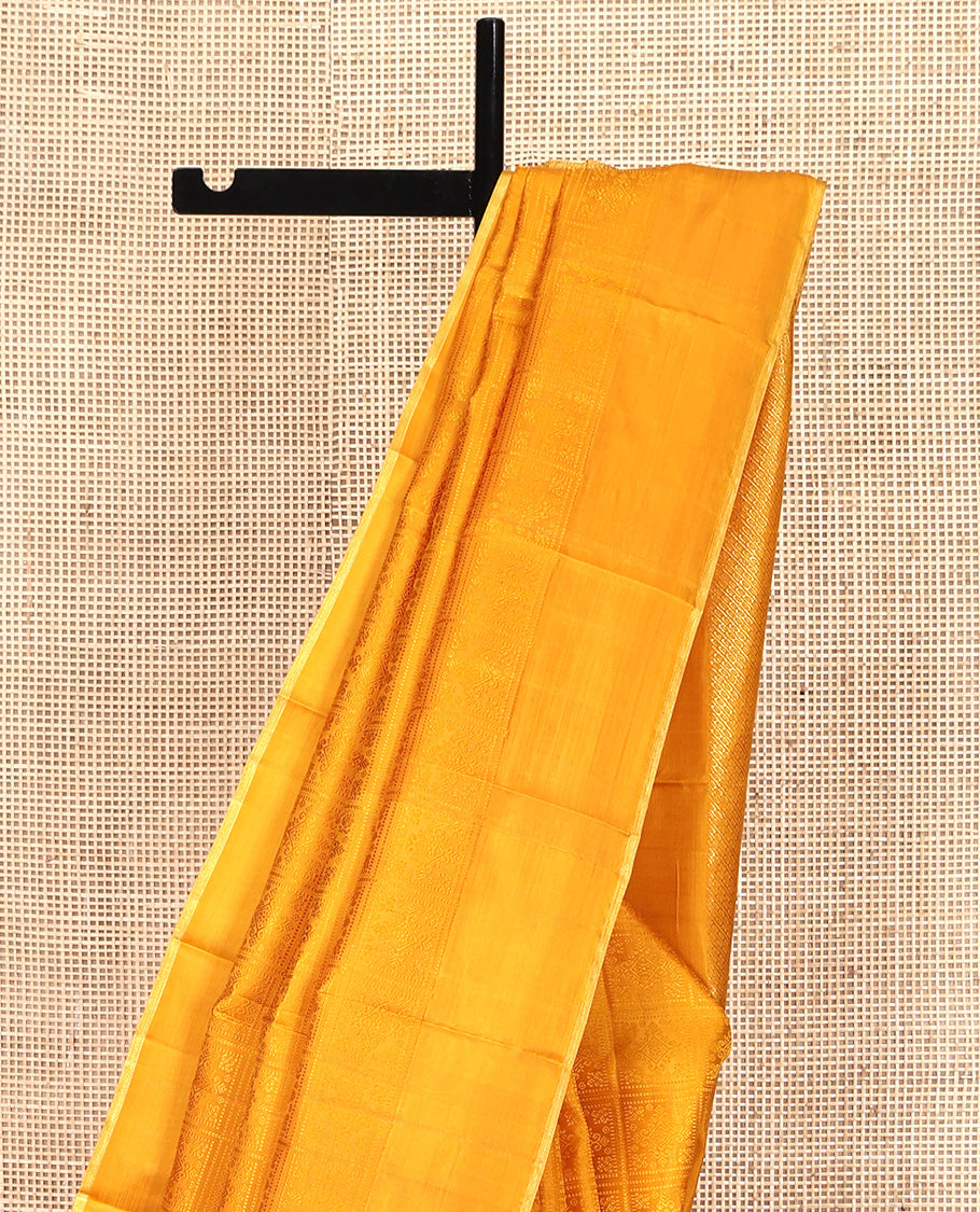 Yellow Parampara Silk Saree, Subtly Sparkled With Embossed Checked Texture On Its Body, Subtle Traditional Border, Geometric Patterned Pallu and Paired with a Matching Blouse