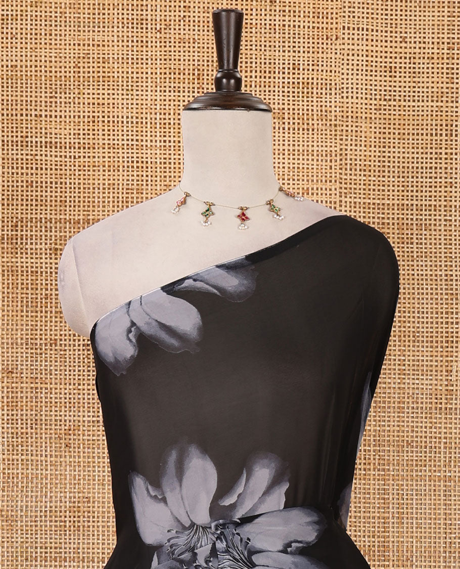 Borderless black big floral motifs printed georgette saree with contrast printed blouse
