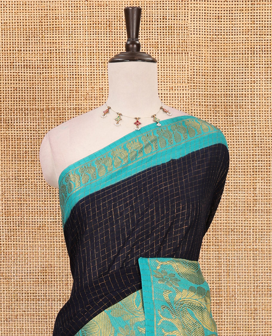 Navy blue zari checked Sungudi cotton saree, contrast zari border decked up with peacock motifs, zari striped pallu & contrast veldhari stripes blouse