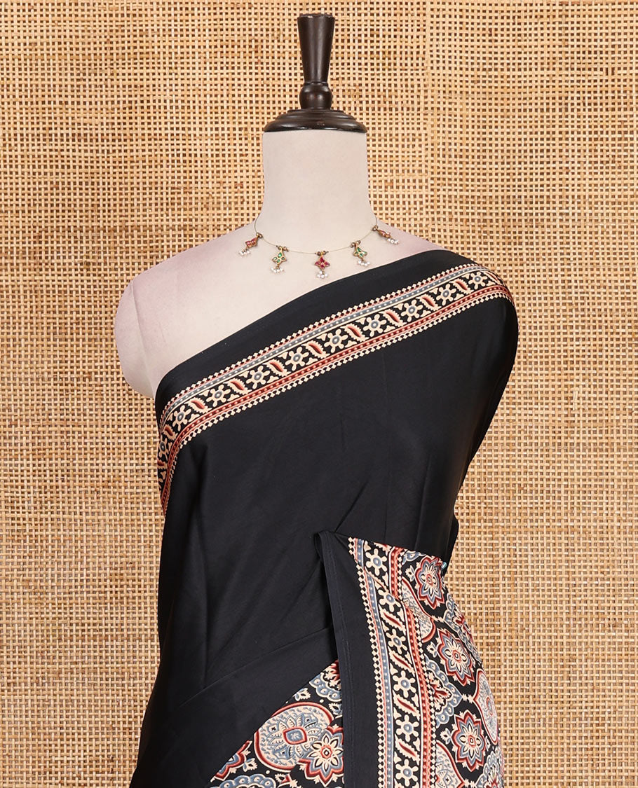 Black plain gajji silk saree with ajrak printed border, ajrak printed geometric pallu, and printed blouse