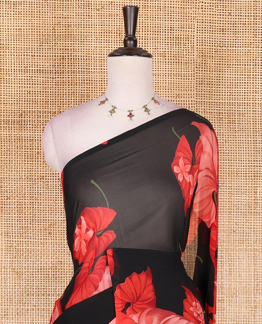 Borderless black leaf and floral motifs digitally printed georgette saree, contrast negative printed blouse