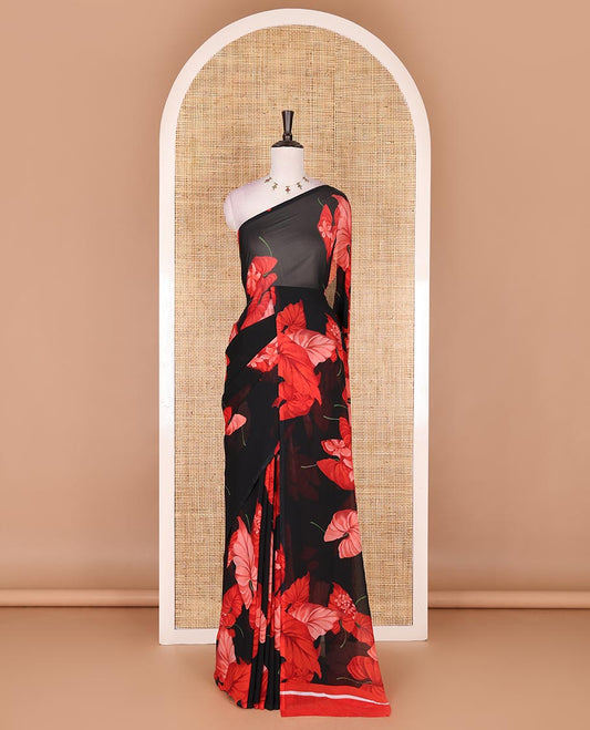 Borderless black leaf and floral motifs digitally printed georgette saree, contrast negative printed blouse