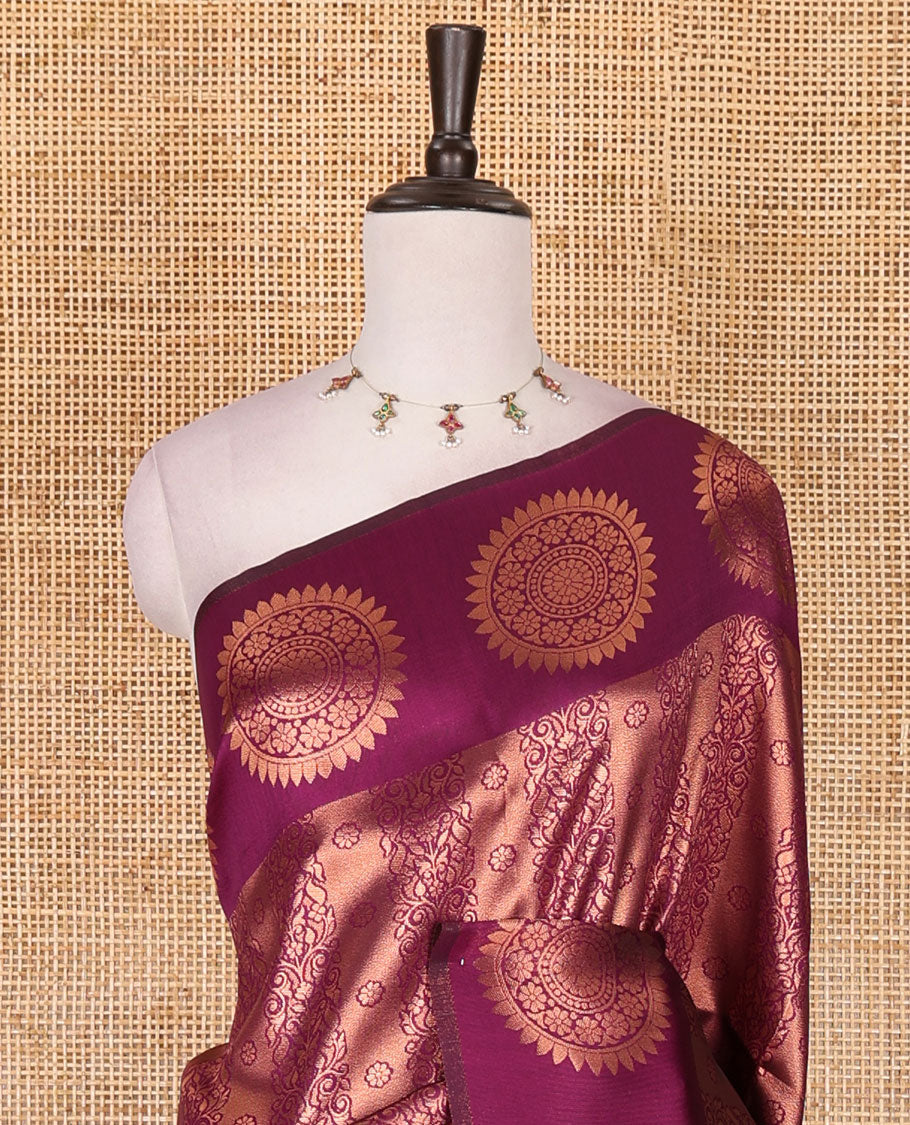 Purple jacquard kanchi tissue saree, zari chakram motifs border, intricately zari woven pallu, and a matching zari design blouse