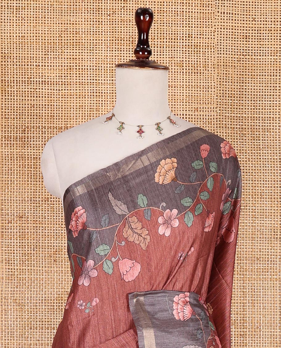Brown floral motifs printed katan silk saree, contrast scallop floral printed with piping zari border, and contrast buttas blouse