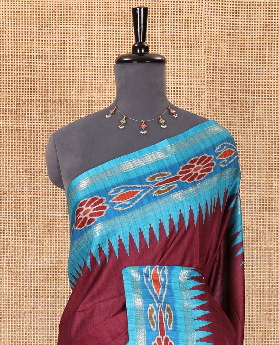 Wine plain Katan silk saree, contrast temple ikkat floral printed border, ikkat floral printed pallu, and ikkat printed blouse