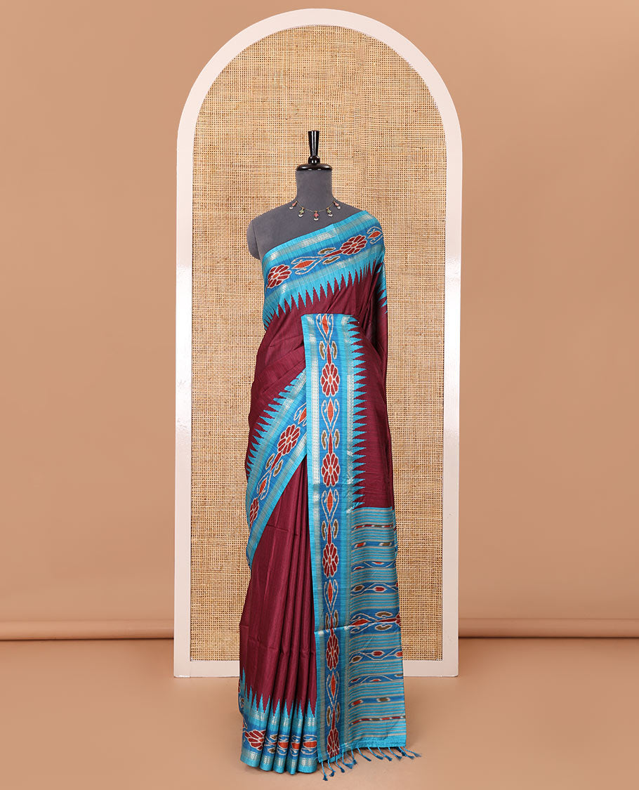 Wine plain Katan silk saree, contrast temple ikkat floral printed border, ikkat floral printed pallu, and ikkat printed blouse