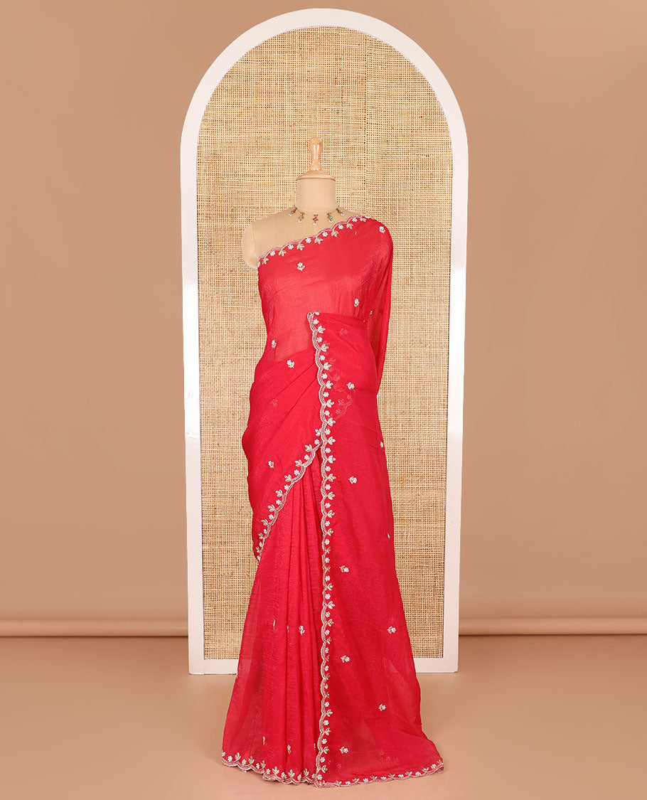 Pink color, floral embroidered motifs crunchy crush saree, scallop pearl embroidered border, embroidered pallu, and a contrast embroidered blouse