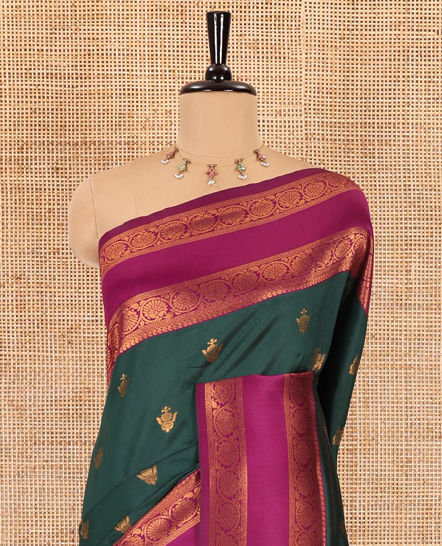 Green copper zari buttas elite soft silk saree , contrast zari weaving border , contrast brocade rich pallu with tussels , and contrast brocade blouse