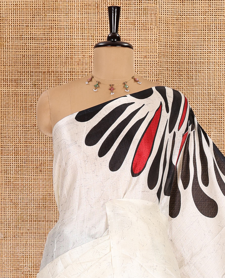 Borderless black fancy motifs batik-printed art khadi silk saree, contrast printed pallu, and a printed blouse