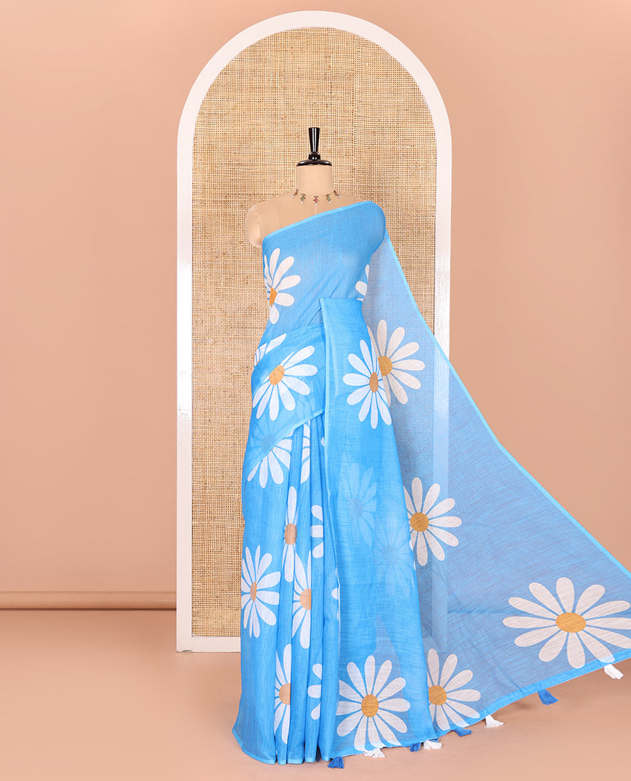 Borderless Blue Linen Saree Beautified with Big Daisy Flower Motifs Printed All Over the Body and Pallu, Complemented by a Contrast Blouse Printed with Daisy Flower Motifs