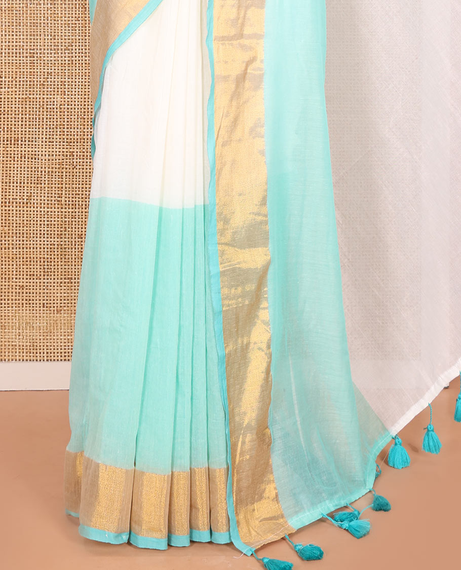 Cream and Sea Green Plain Khadi Mul Cotton Saree Features a Gleaming Zari Bavanji Border and a Contrast Sea Green Plain Blouse