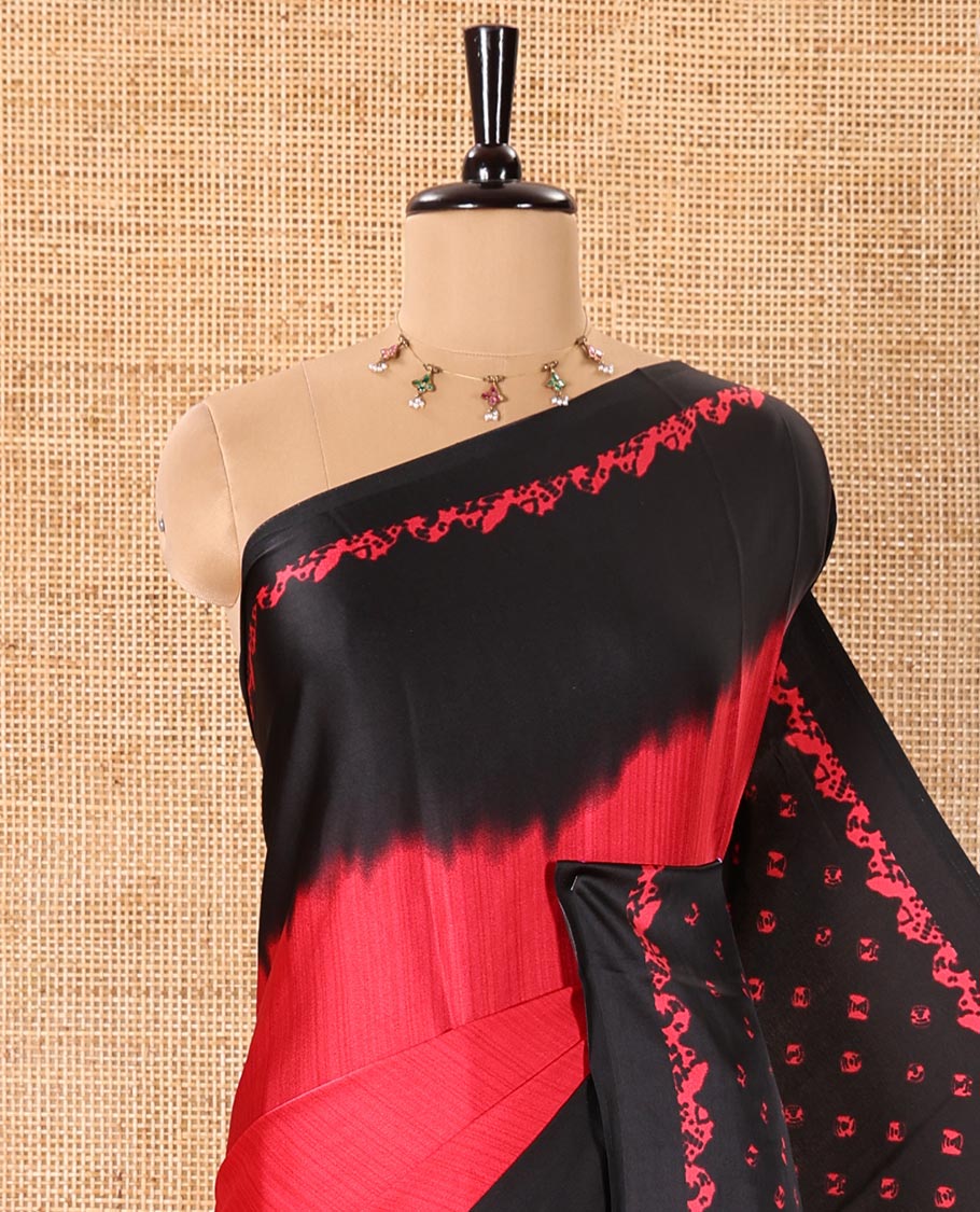 Black and Red Satin Crepe Saree Elevated with Shibori Prints, Complemented by Contrast Shibori Printed Border, Pallu Decked Up with Shibori Prints, and Paired with a Plain Blouse
