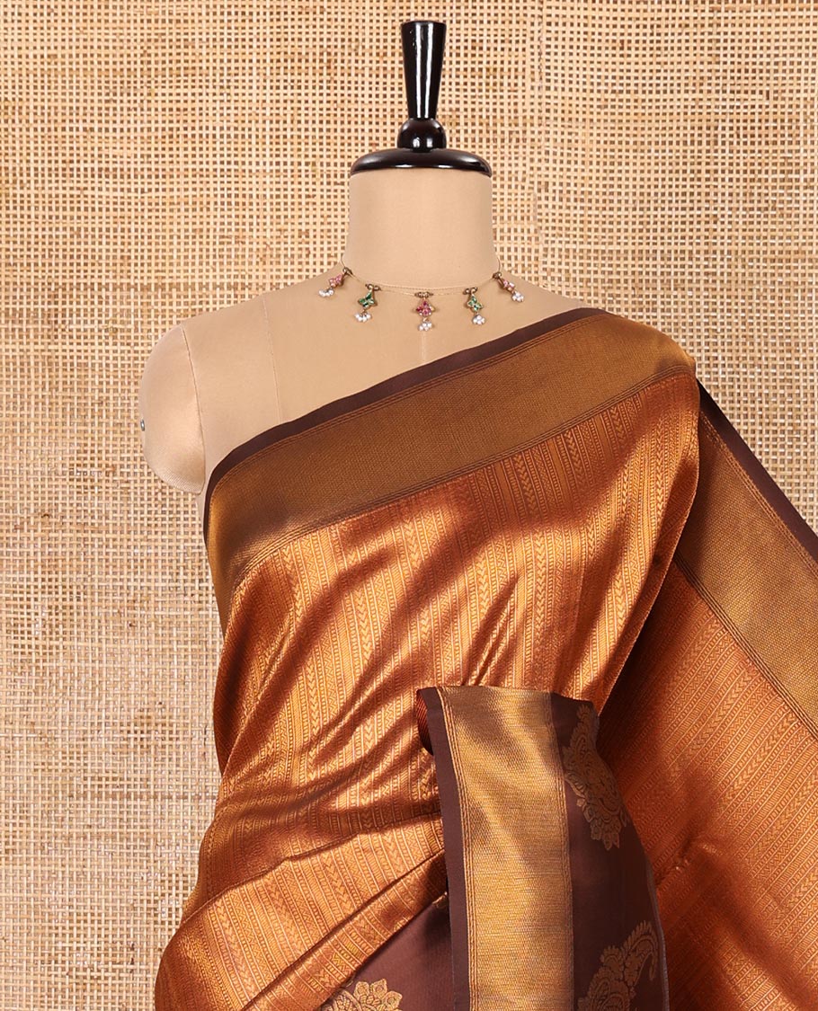 Rust Orange Kanchi Silk Saree, Adorned with Jacquard Design All Over Its Body, Complemented by a Contrast Zari Border of Paisley Designs, Gracefully Embellished Pallu, and Paired with a Contrast Jacquard Blouse