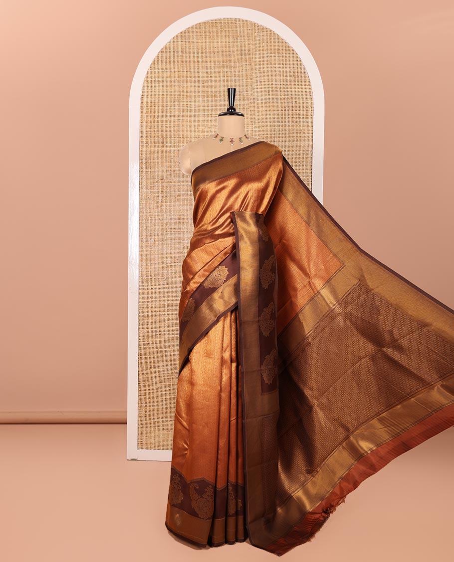 Rust Orange Kanchi Silk Saree, Adorned with Jacquard Design All Over Its Body, Complemented by a Contrast Zari Border of Paisley Designs, Gracefully Embellished Pallu, and Paired with a Contrast Jacquard Blouse