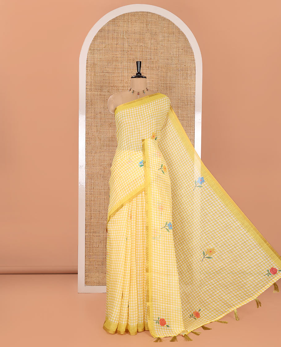 Yellow Linen Cotton Saree, Beautiful Decked Up with Checks and Floral Motifs Printed All Over Its Body, Subtle Piping Border, Pallu Mirrors the Same Design, and Paired with a Printed Blouse