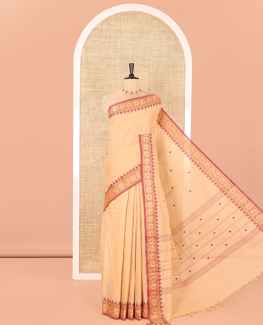 Chikku Chettinad Cotton Saree, Delicately Woven with Thread Buttas All Over Its Body, Complemented by a Contrast Temple Border of Peacock Designs, Pallu of Buttas and Stripes, and Paired with a Matching Blouse