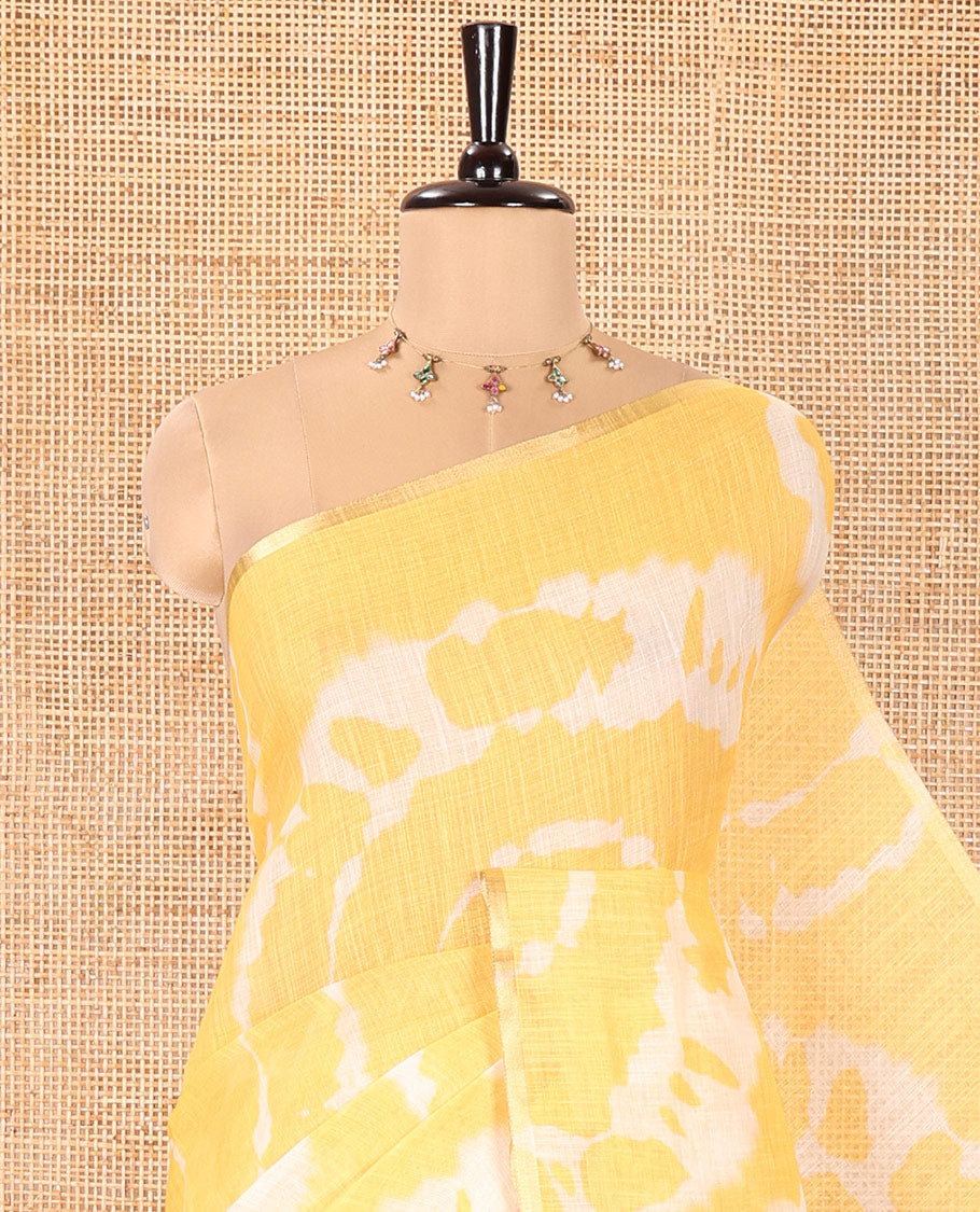 Borderless Yellow Linen Cotton Saree, Decked Up with Shibori Printed on Its Body, Complemented by Contrast Floral Printed Pallu, and Paired with a Contrast Floral Printed Blouse