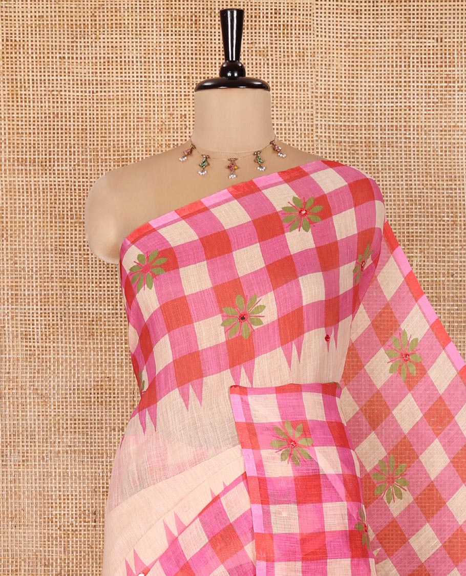 Chikku and Pink Linen Cotton Saree, Beautified with Mirror Work On Its Body, Complemented by Contrast Temple Checked Border of Floral Print and Mirror Work, Pallu Mirrors the Same Design and Paired with a Contrast Blouse