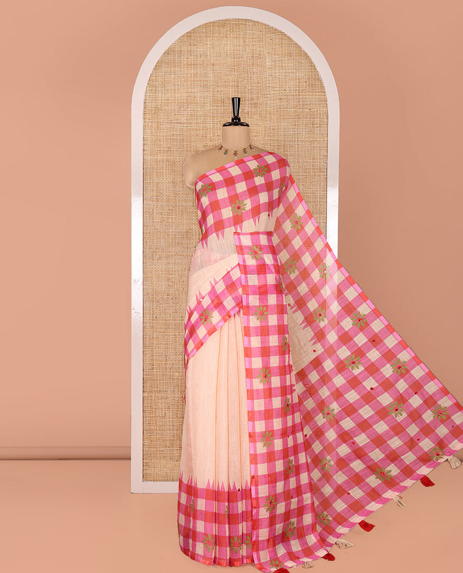 Chikku and Pink Linen Cotton Saree, Beautified with Mirror Work On Its Body, Complemented by Contrast Temple Checked Border of Floral Print and Mirror Work, Pallu Mirrors the Same Design and Paired with a Contrast Blouse