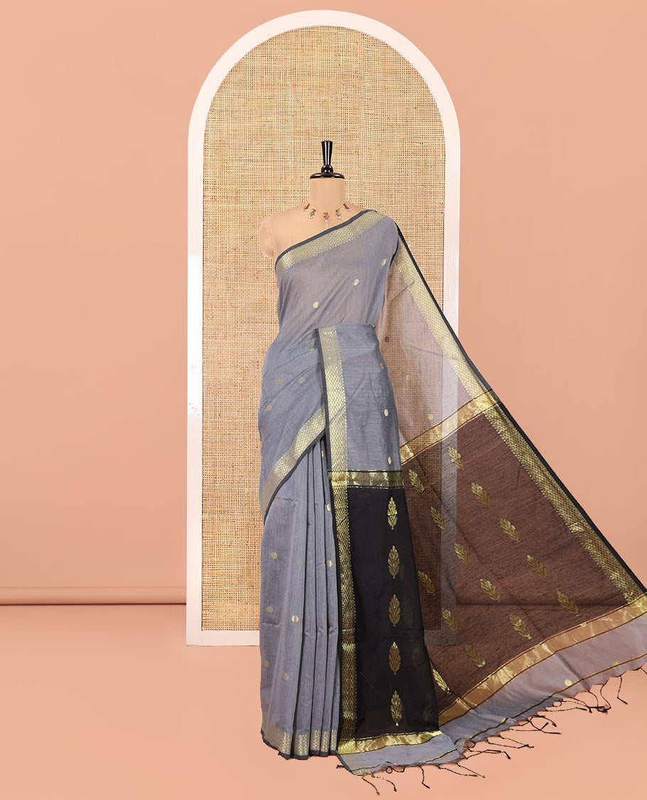 Grey Maheshwari Cotton Saree, Adorned with Flower Buttas All Over Its Body, Highlighted by Traditional Zari Border, Complemented by Contrast Pallu of Floral Buttas, and Paired with a Contrast Blouse
