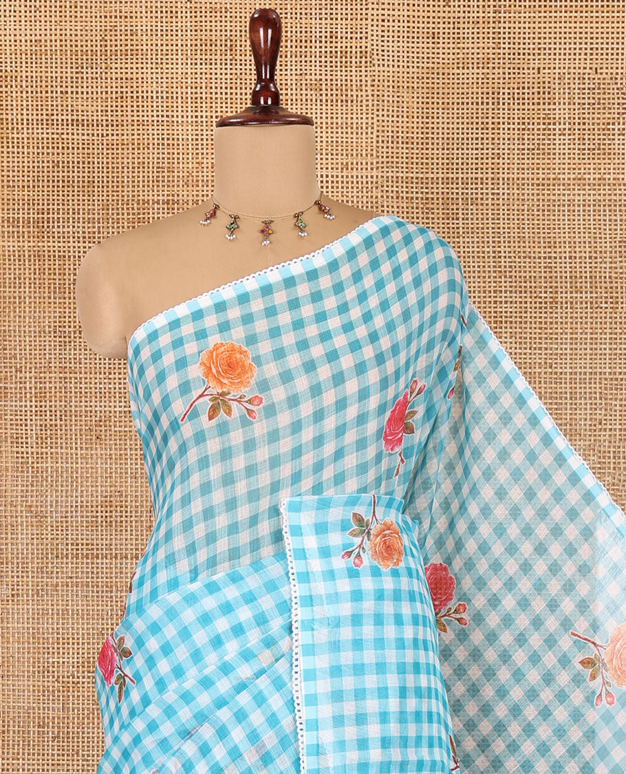 Blue Linen Cotton Saree, Adorned with Checks and a Floral Print, Lace Border, a Self-Pallu, and a Contrast Blouse