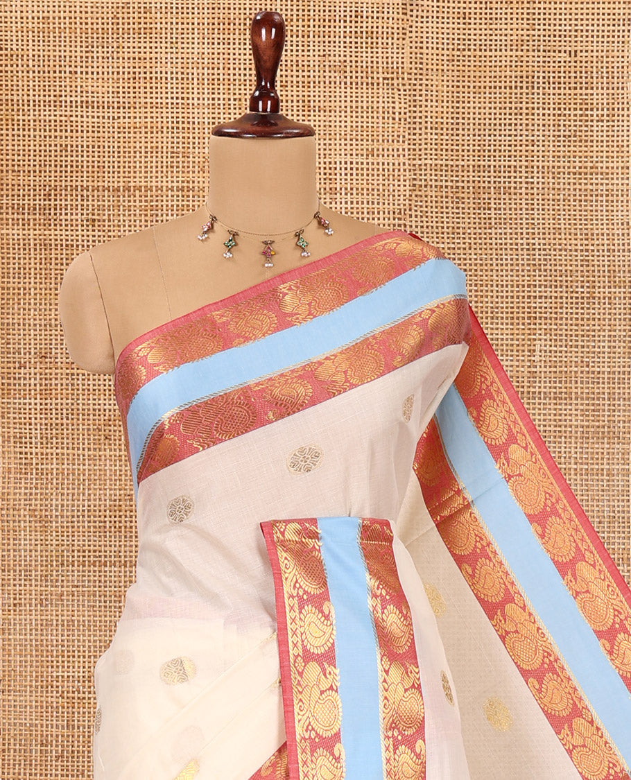 Cream Kerala Cotton Saree, Bedecked with Zari Buttas, Contrast Peacock-Paisley Border, a Matching Blouse