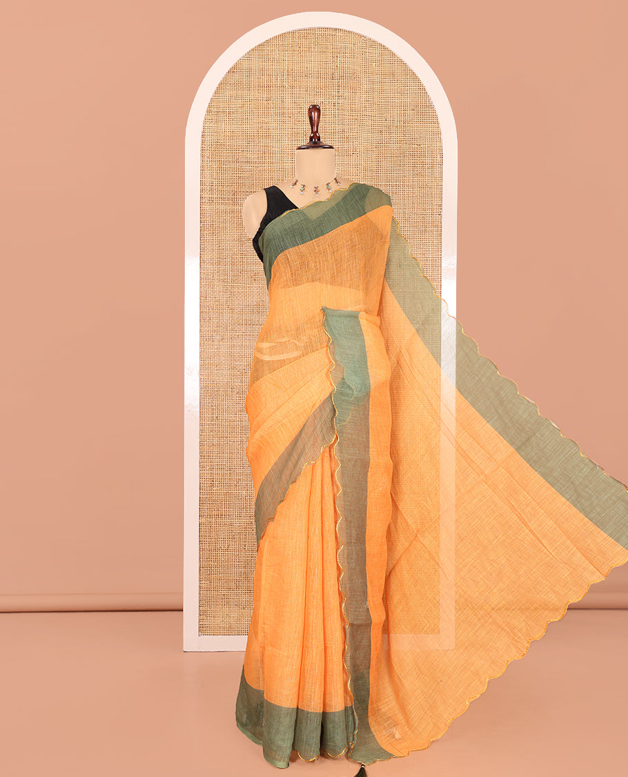 Yellow Plain Linen Cotton Saree, Contrast Plain Scallop Border, a Self-Pallu, and Contrast Kalamkari Printed Blouse