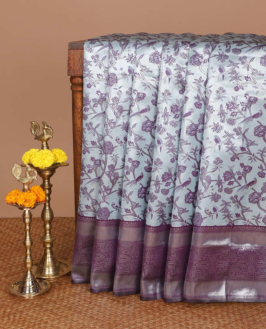 Blue with purple fancy zari weaving design litchi silk saree with contrast jacquard border & weaving rich pallu along with butta zari design blouse