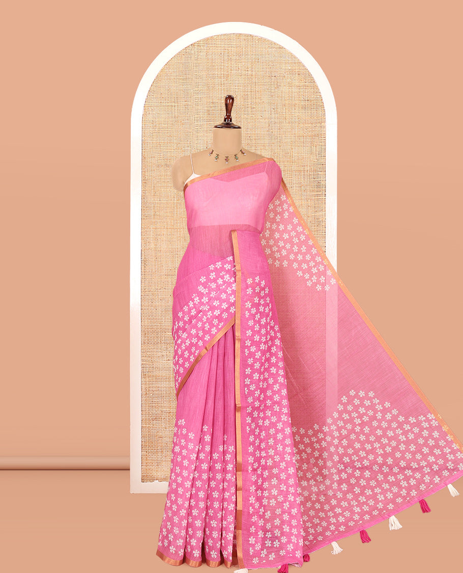 Pink Linen Cotton Saree Features Half-And-Half-Style Flower Motifs Print, a Piping Border, and a Matching Blouse