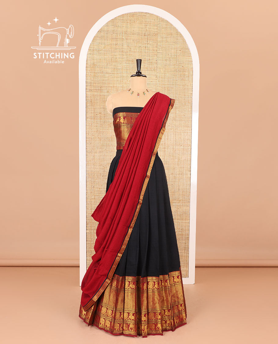 Black half-saree, plain with contrast traditional zari border skirt, matching blouse and a contrast zari border dhavani