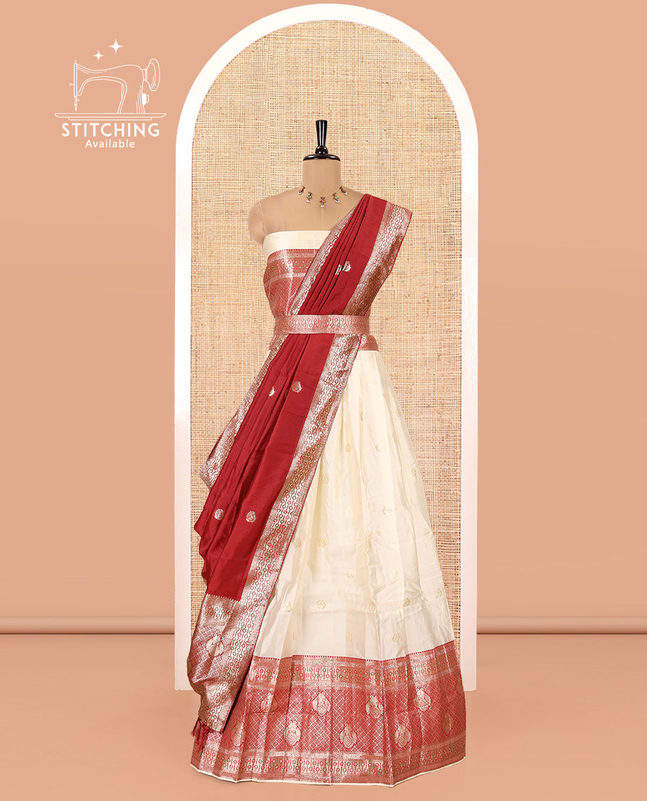 Cream-Red Semi-Banarasi Half-Saree Set Featuring Buttas Skirt, Contrast Traditional Border, Matching Blouse, and Banaras Dhavani