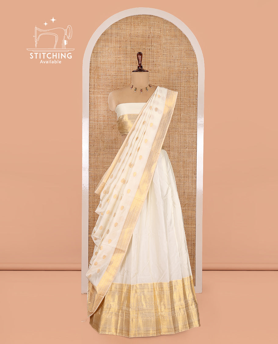 Cream Banarasi Silk Half-Saree Features a Plain Skirt, a Traditional Border, Matching Blouse, and Zari-Woven Dhavani