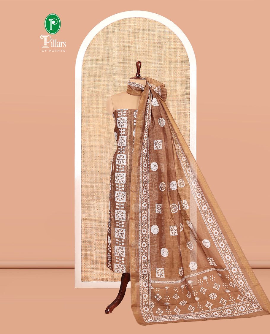 Brown Chanderi Material Chudidar Features Batik Printed Top, a Matching Bottom, and Batik Printed Dupatta