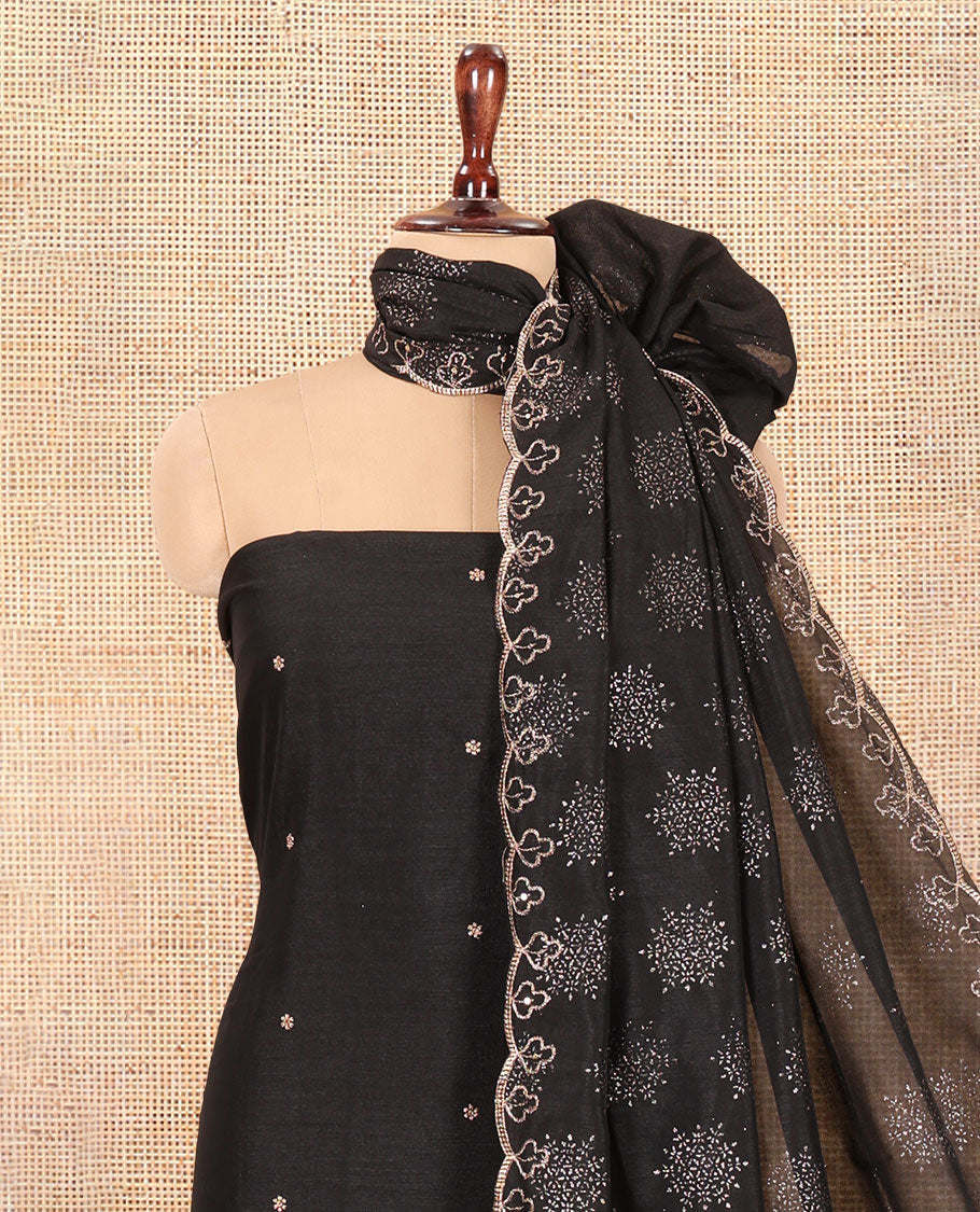 Black Semi-Silk Material Churidar Set, Floral Embroidered Top, a Matching Bottom, and a Scallop Foil Printed Dupatta